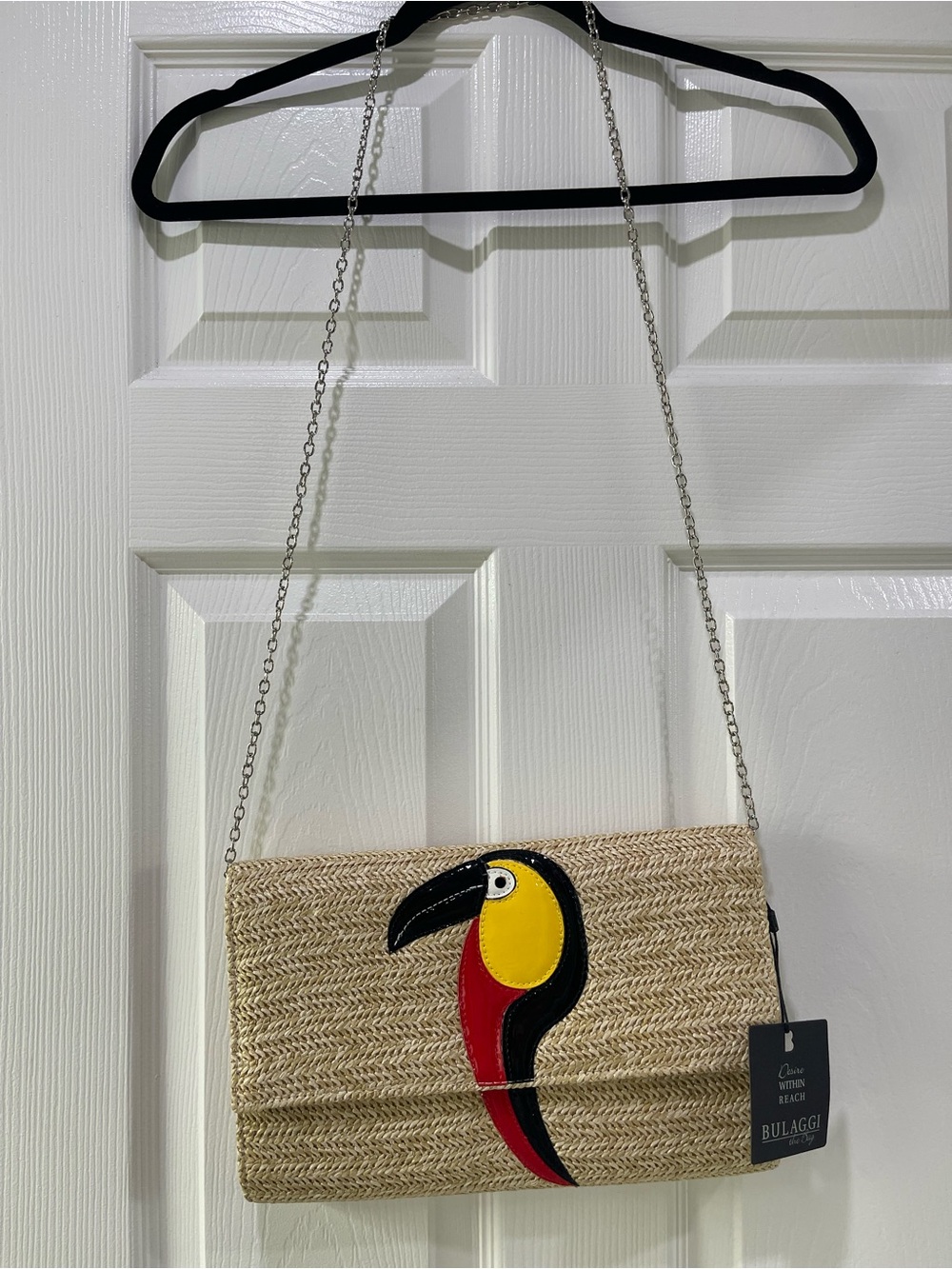 Bulaggi Natural Straw Crossbody Bag with Colorful Toucan Patch
